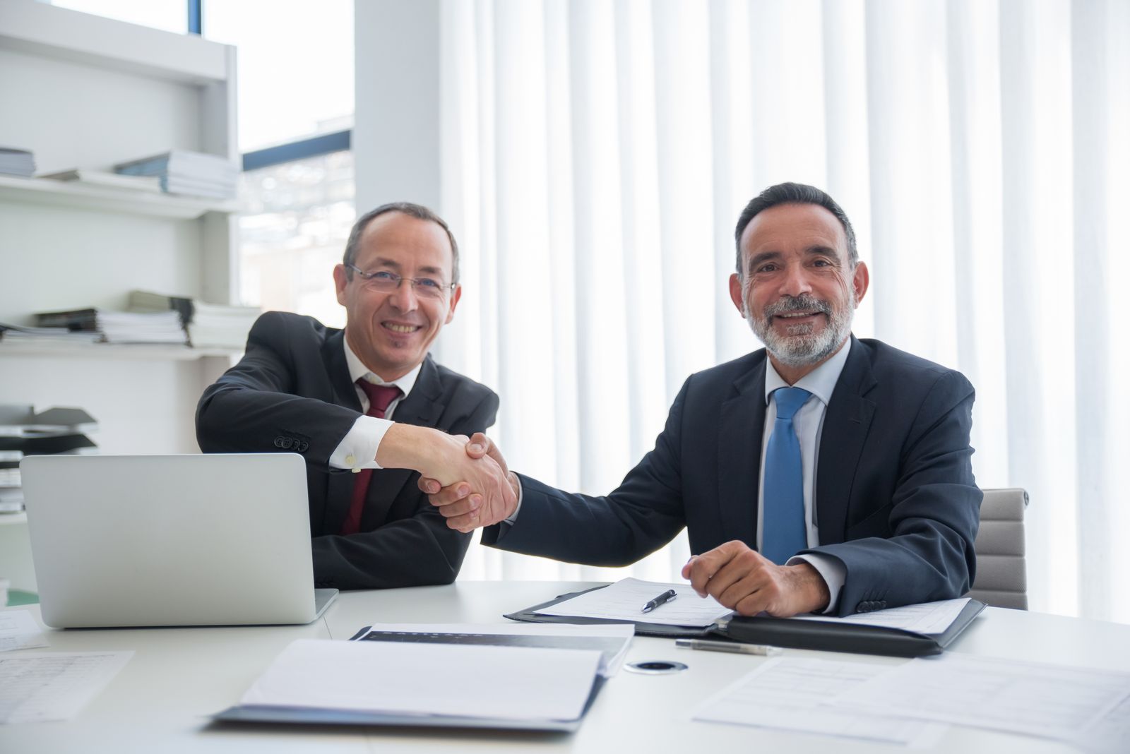 Two businesspeople shaking hands